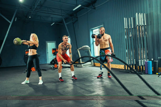 istock training with weights and ball in the  gym 1070240336