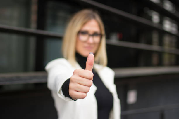 istock Business woman shows thumb up 1070240702