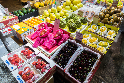 Various fresh fruits on a market stall at Yau Ma Tei fruit market. Hong Kong, Kowloon, January 2018