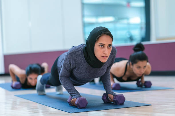 istock Planking in fitness class 1070245560