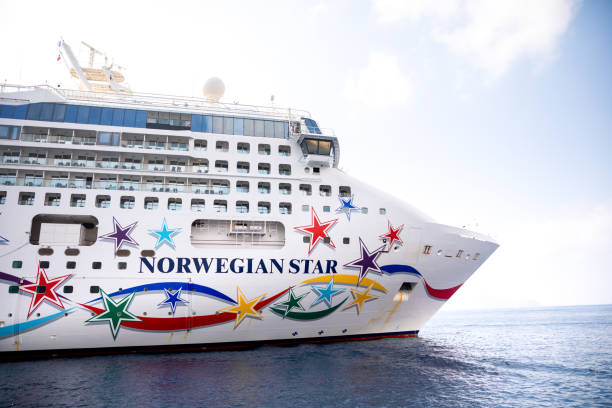 norwegian star is a cruise ship owned and operated by norwegian cruise line shipyard in santorini, greece - norwegian culture imagens e fotografias de stock