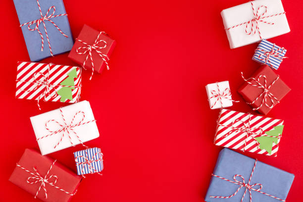istock Holiday background with a christmas presents. Flat lay. 1070250348