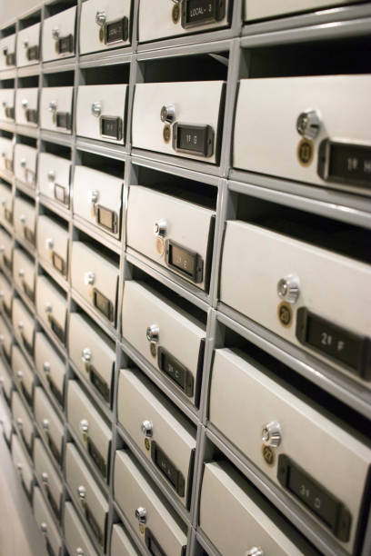 istock Residential appartment block building interior letter boxes with numbers. 1070266652