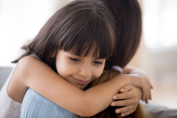 istock Sincere daughter hugging mother expressing love and devotion 1070267376