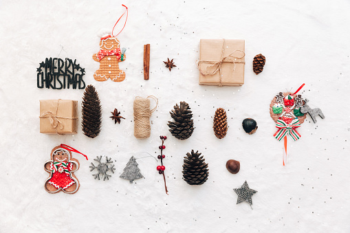 Flat lay different christmas decorations on white background. Holiday composition