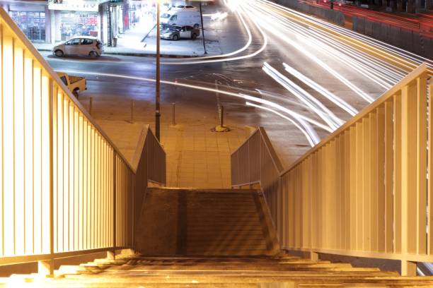 istock Traffic at night inside the city 1070273004