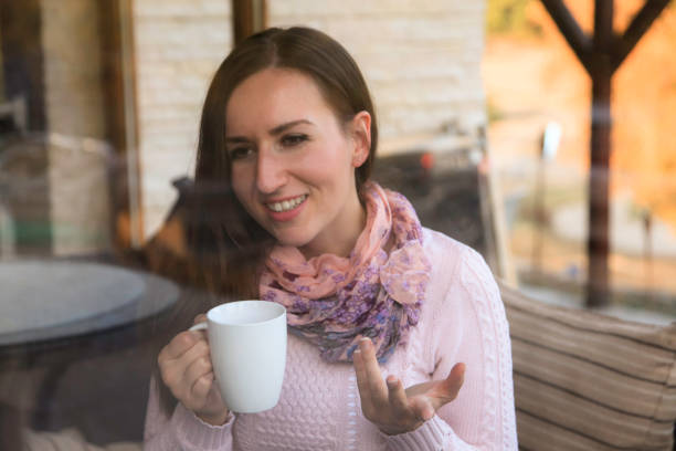 istock Woman in a cafe 1070273924