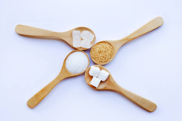 istock Various types of sugar on white background. 1070278838