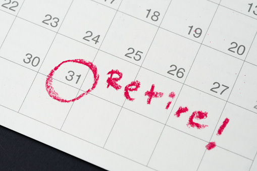 Retirement goal or financial freedom, planning for success salary man, important target red circle end of month day on calendar target aim as Retire or last day of working.