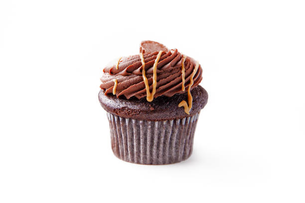 peanut butter chocolate cupcake - cupcake chocolate icing candy stock-fotos und bilder