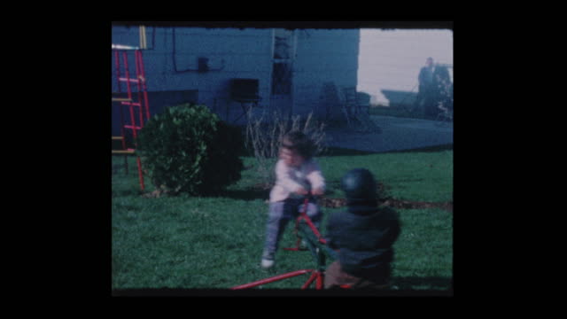 1963 2 little kids ride on backyard Whirlygig ride