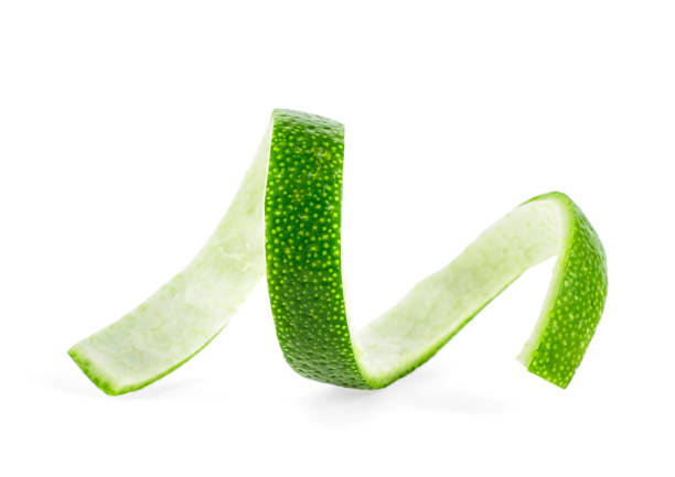 istock Curly lime peel twist isolated on white background 1070304946