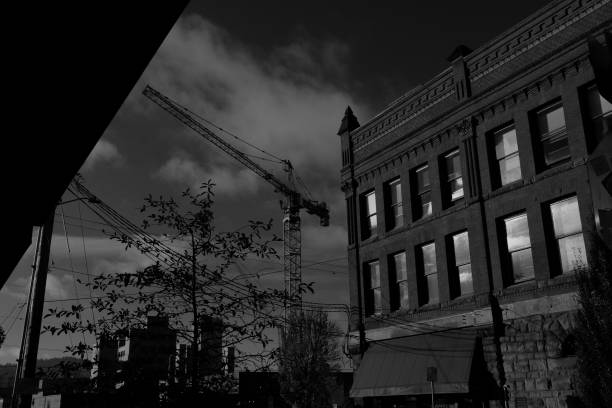 istock Crane next to hundred years old building 1070310112