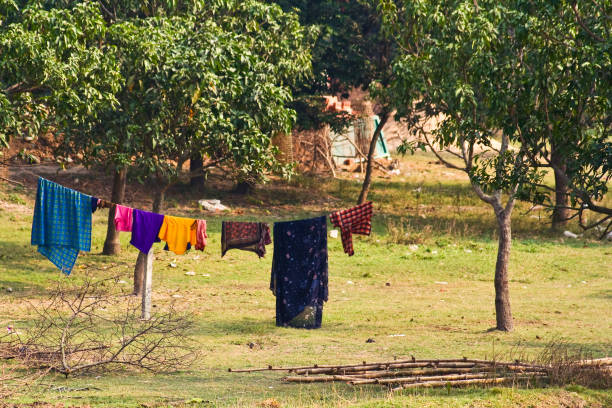 istock Colorful clothes drying in open hanging on road 1070310408