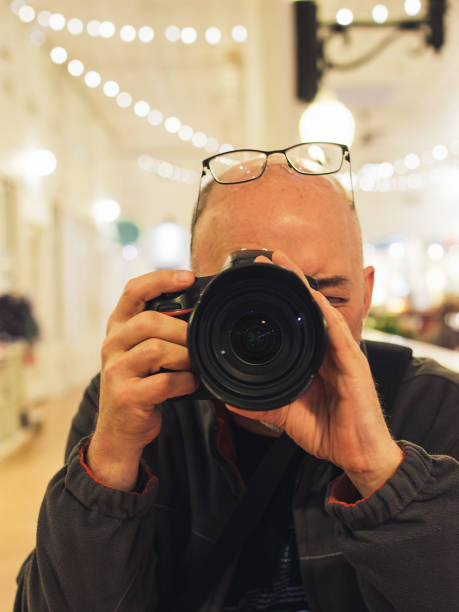 istock Photographer Man, Eyeglasses, Bald, Taking Picture 1070313008
