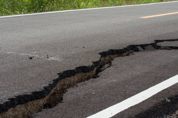 istock Asphalt surface on the street was demolished due to poor construction. 1070313226