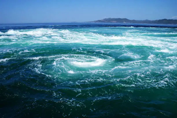 The Naruto whirlpools (Naruto no Uzushio) are tidal whirlpools in the Naruto Strait, a channel between Naruto in Tokushima and Awaji Island in Hyōgo, Japan.