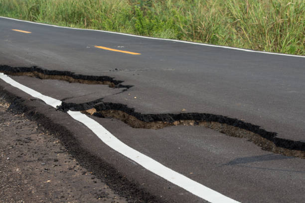 istock Asphalt surface on the street was demolished due to poor construction. 1070313724