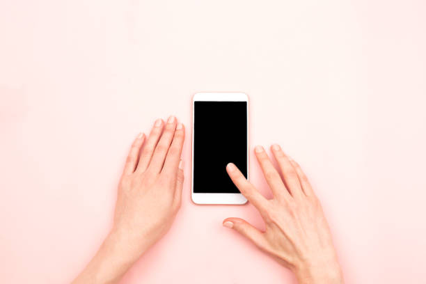 istock Woman hands and a smartphone 1070321166
