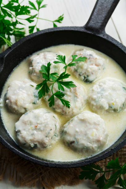 istock Chicken meatballs in milk sauce 1070324298
