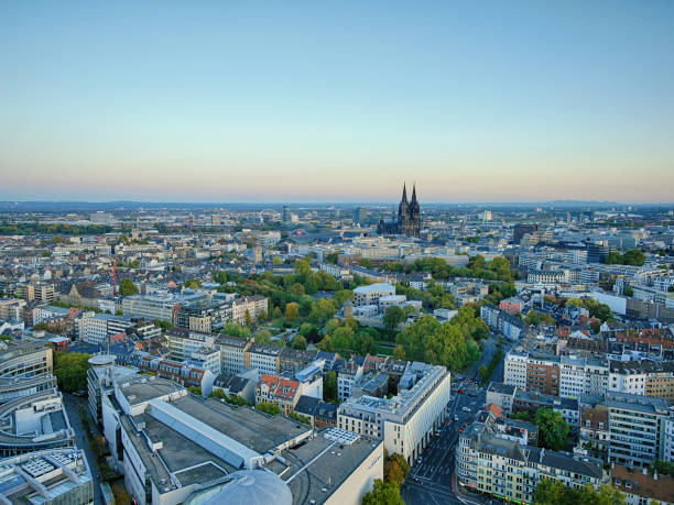 City cologne from high angle aerial viewpoint with cathedral, no clouds at dusk