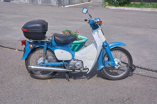 Krasnoyarsk, Russia -  July 27, 2018: Vintage small  motorcycle Honda 50 std