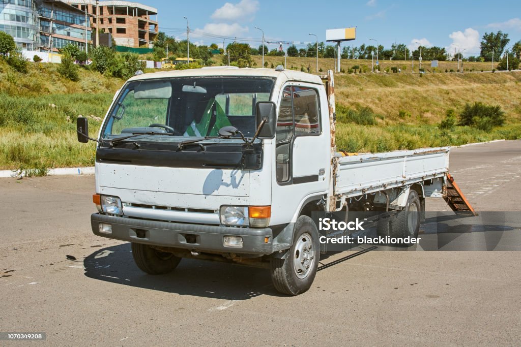 Nissan Atlas 300 View left front Krasnoyarsk, Russia - August 19, 2018: Nissan Atlas 300 car the tow truck waits for loading of small racing cars karting. View left front Assistance Stock Photo