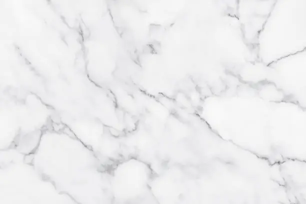 Photo of White marble texture with natural pattern for background.