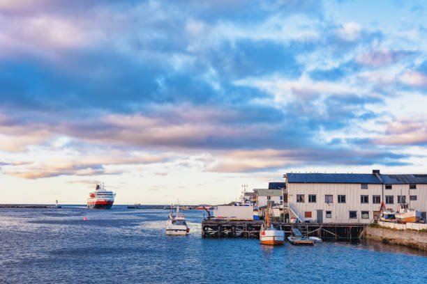 The big passenger-and-freight liner comes into the Norwegian port in the evening