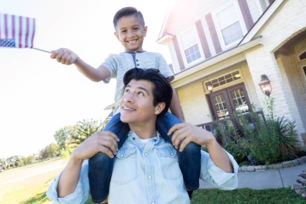 istock Patriotic little boy waves American flag 1070362242