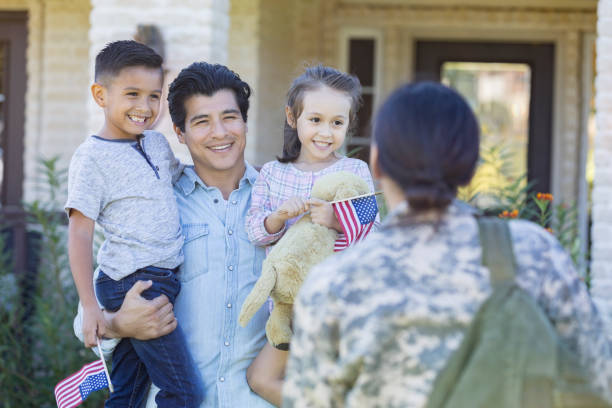 istock Cheerful man greets army wife 1070362298