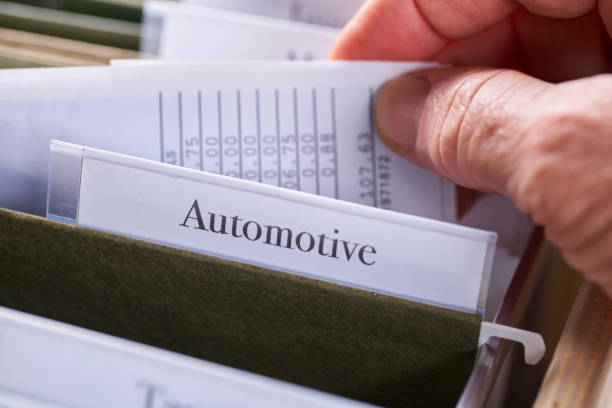 istock AUTOMOTIVE: Files and folders in desk drawer with labels and tabs: Home office management 1070362970