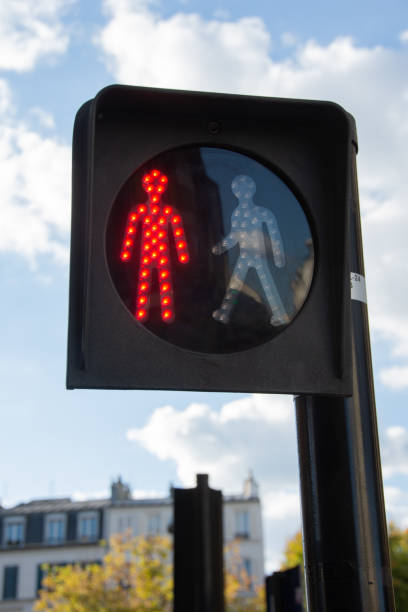 istock Pedestrian crossing red traffic light, France 1070367272