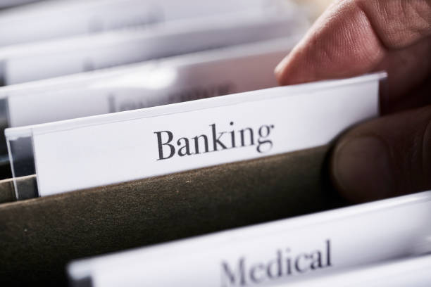 istock BANKING: Files and folders in desk drawer with labels and tabs: Home office management 1070367292