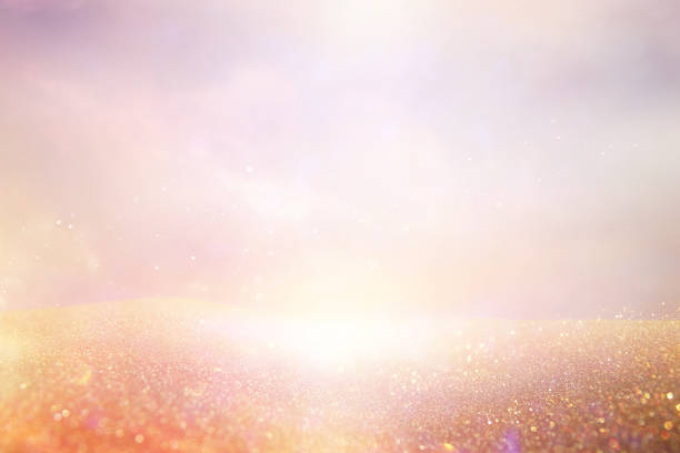 glitter vintage lights background. silver and gold. de-focused