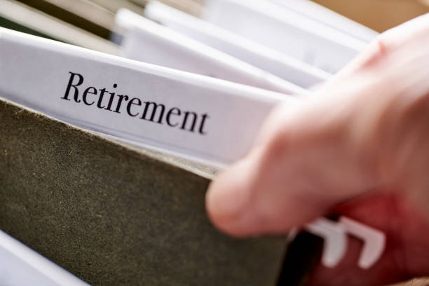 istock RETIREMENT: Files and folders in desk drawer with labels and tabs: Concept planning for retirement 1070377332