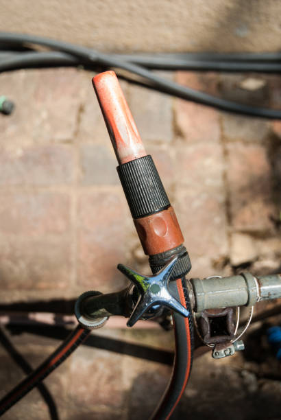 istock garden tap and hose 1070378862