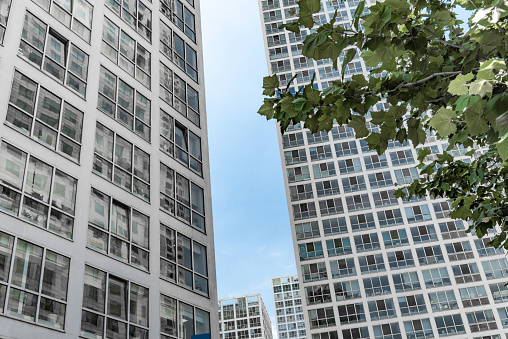 Low Angle View Of Office Buildings In The City Of Beijing Against Blue Sky