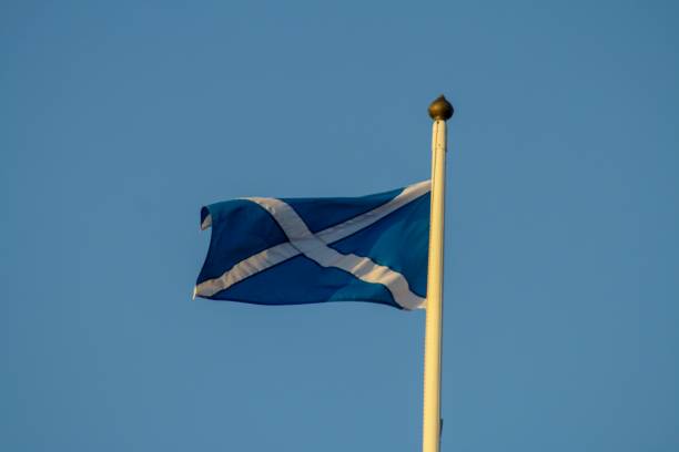 istock Scottish Saltire flying during sunny day 1070383874