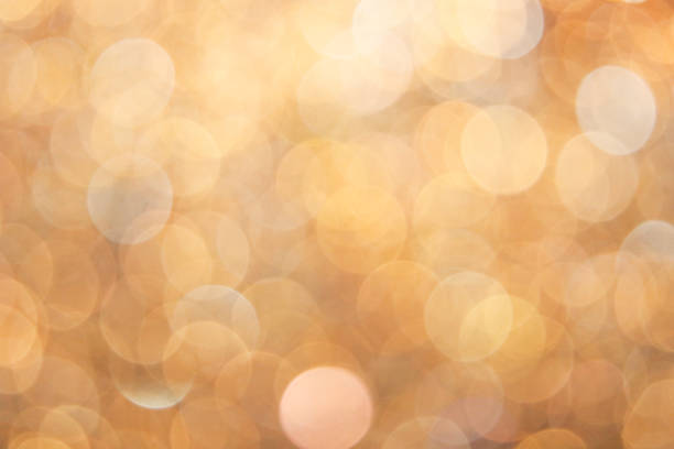 istock Abstract golden bokeh background 1070383944