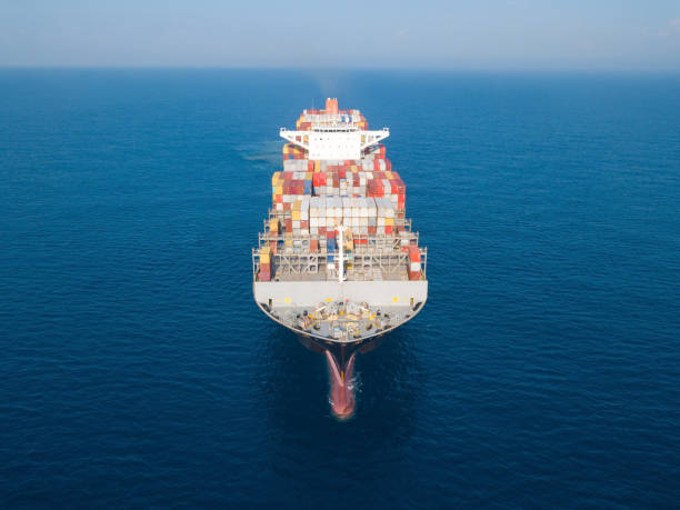 istock Large container ship at sea - Aerial image 1070384028