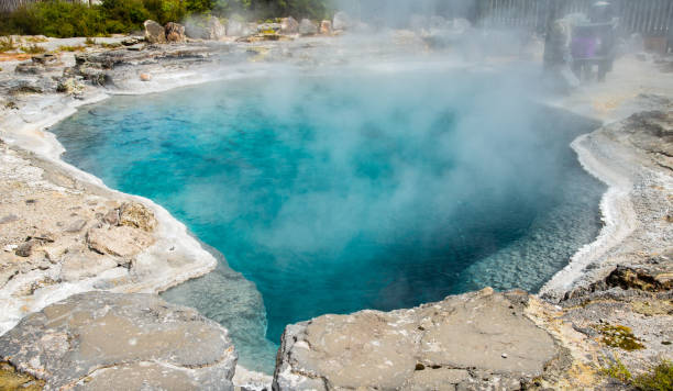 The beautiful turquoise hot spring called "Champagne Pool" in Whakarewarewa Maori village in Rotorua, New Zealand. Beautiful hot spring in Rotorua. whakarewarewa stock pictures, royalty-free photos & images