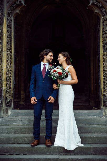 Newly wed couple on the church steps