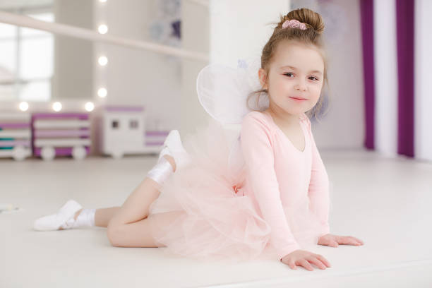 istock Little cute girl in class in ballet studio 1070390212