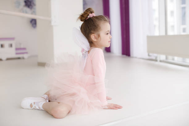 istock Little cute girl in class in ballet studio 1070390230