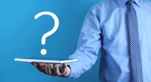 istock Man holding question mark. Business concept 1070392126
