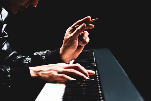 male songwriter hands composing a song on piano, song writing concept - human finger sound mixer music producer imagens e fotografias de stock