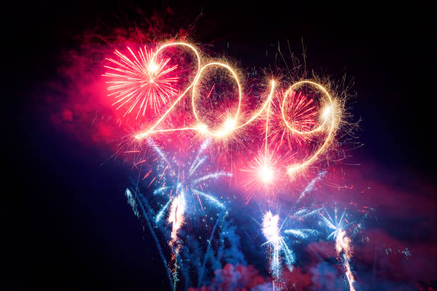 istock Sparkler Happy New Year 2019 With Fireworks 1070393182
