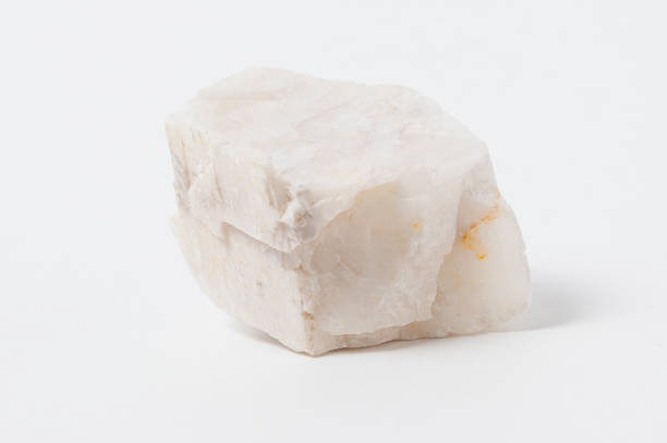 istock Calcite ore isolated on a white background with smooth shade. 1070395360