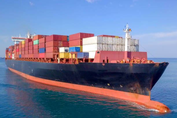 istock Large container ship at sea - Aerial image 1070397902